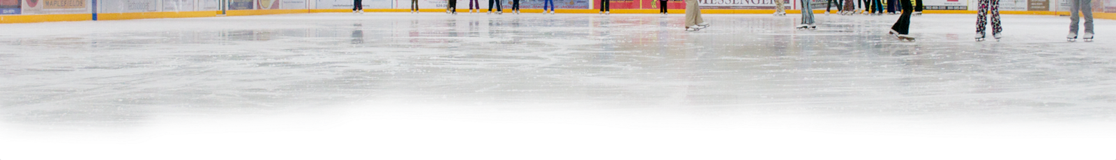 Skaters practicing on the rink